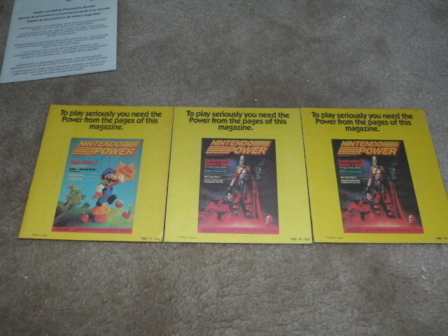 LOT VINTAGE VIDEO GAME NINTENDO ATARI PAPERWORK BOOKLETS CATALOG POSTER INSERTS