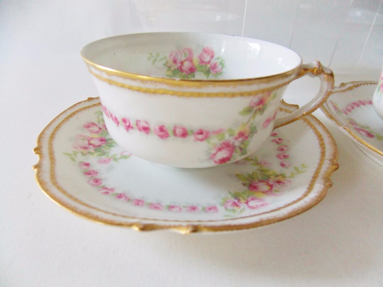 LIMOGES FRANCE SET OF FOUR DROP ROSE STYLE CUPS AND SAUCERS PINK ROSES PRETTY