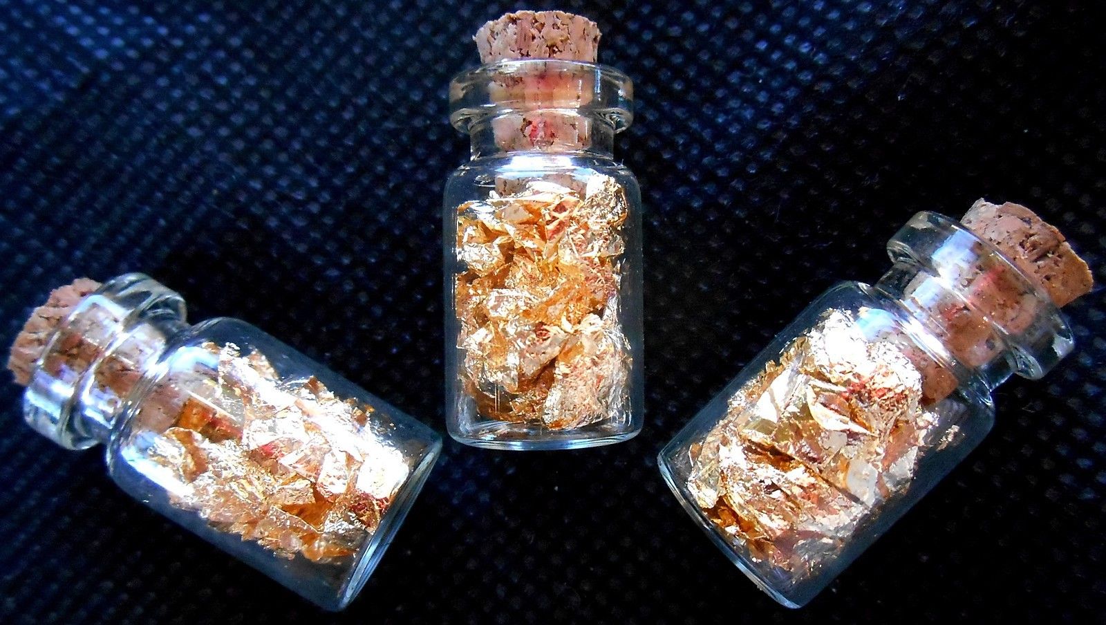 24k GOLD leaf flakes in 20 glass vials ¾X½ inch each sealed with cork NO LIQUID